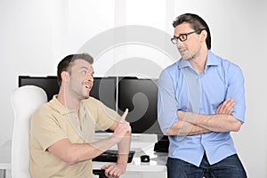 He has another point of view. Two young businessmen talking about business and gesturing