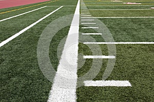 Hash marks on football field photo