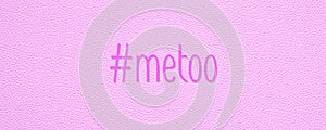 Hashtag metoo on pink leather texture background photo