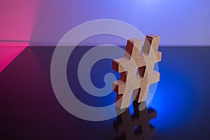 Hashtag Tagging Symbol letter on color light background. photo