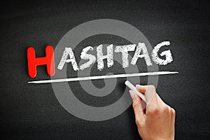 Hashtag text on blackboard, internet concept background