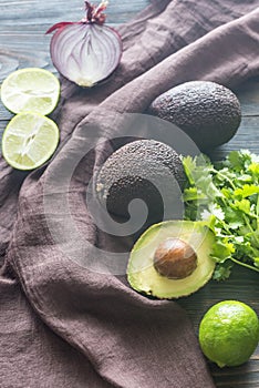Hass avocados with ingredients for guacamole