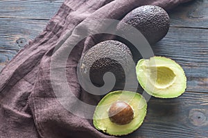 Hass avocados on the wooden background