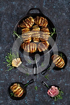 Hasselback potatoes with cheese and bacon