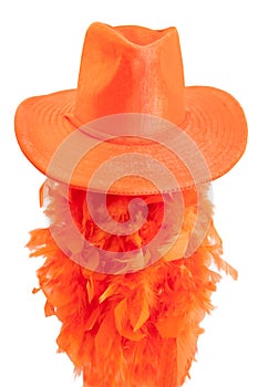 Hat and boa on white background as tipical accessories on the Koningsdag in Amsterdam.
