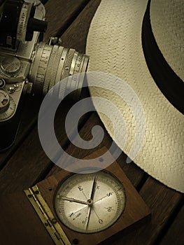 Hat, camera and compass