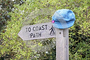 Hat on Coast Path Sign
