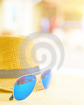 Hat and glasses on the table.