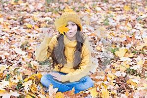 Hat keep warm. Kid wear warm soft knitted hat. Playful mood. Warm woolen accessory. Girl long hair happy face fall