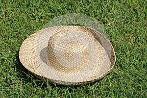 Hat on the lawn background