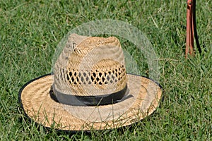 Hat on the lawn background