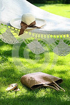 Hat with ribbon on hammock