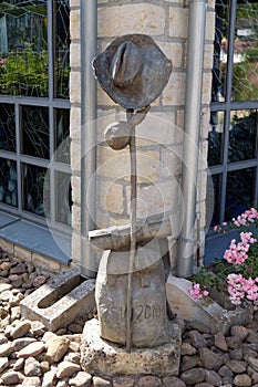 Hat, stick and backpack, symbols of pilgrims in Santiago de Compostela