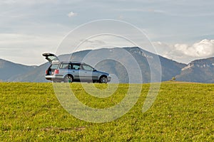 Hatchback car on the top of the hill
