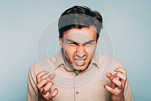 Hate kill anger man distorted facial expression photo