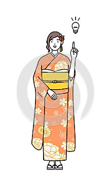 Hatsumode at New Year\'s and graduation ceremonies, weddings, etc, Woman in furisode coming up with an