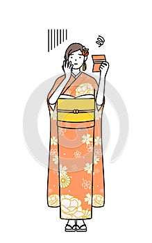 Hatsumode at New Year\'s and graduation ceremonies, weddings, etc, Woman in furisode looking at her