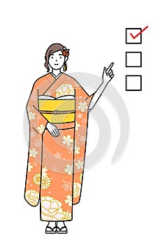 Hatsumode at New Year\'s and graduation ceremonies, weddings, etc, Woman in furisode pointing to a