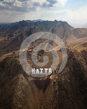 Hatta city sign in Hajar mountains in Hatta enclave of Dubai in the UAE photo
