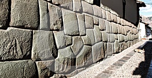 Hatun Rumiyoc street with Incan twelve angle stone in Cusco, Peru