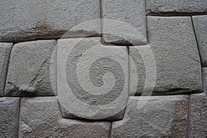 Hatun Rumiyoc street with Incan twelve angle stone in Cusco, Peru.