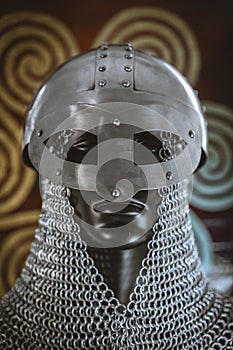 Hauberk, helmet of viking warrior with mail on coat of arms with