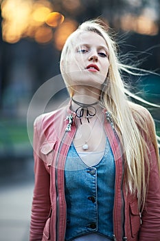 Haughty blond woman in the street on sunset