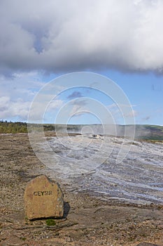 Haukadalur, Iceland: Stone marker at the site of the dormant Geysir hot spring