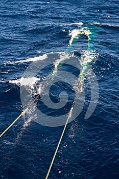 Hauling otter trawl fishing nets