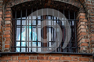 old brick building haunted in the window