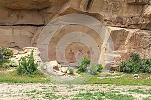Haunting pictographs on a sandstone panel in Sego Canyon, Utah
