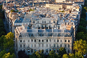 Haussmanian building with curvilinear facade and Paris Rooftops, France