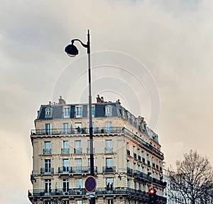 The haussmannian building in the evening, the typical parisian architectural style, Paris, France