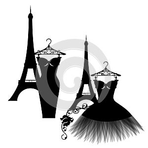 Haute couture little black dress and eiffel tower vector silhouette set