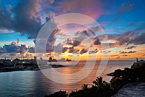 Havana bay entrance and city skyline at dusk