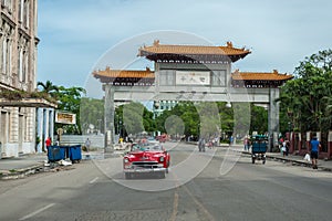 HAVANA, CUBA - OCTOBER 22, 2017: Havana Cityscape with Local Vehicles, Architecture and People. Cuba. China Gate