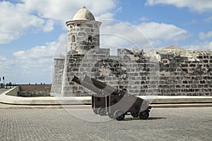 Havana, Cuba - 22 January 2013: A fortress with very old cannons in the foreground
