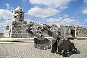 Havana, Cuba - 22 January 2013: A fortress with very old cannons in the foreground