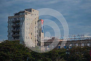 Cuban Flag hanging on a building photo