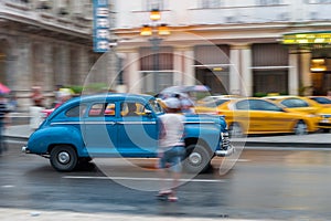 HAVANA, CUBA - OCTOBER 21, 2017: Old Style Retro Car in Havana, Cuba. Public Transport Taxi Car for Tourist and Local People. Blue
