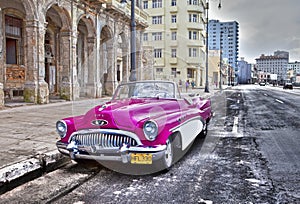 HAVANA- JANUARY 27, 2013: Old American retro car 50th years of the last century, an iconic sight in the city, on the Malecon str