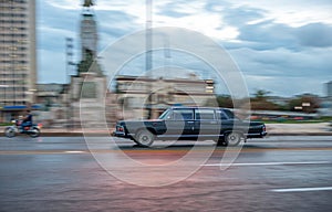 HAVANA, CUBA - OCTOBER 20, 2017: Havana Old Town and Malecon Area with Old Taxi Vehicle. Cuba. Panning.