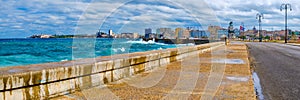 The Havana skyline and the iconic Malecon seawall with a stormy ocean