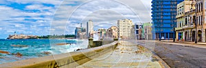 The Havana skyline and the iconic Malecon seawall with a stormy ocean