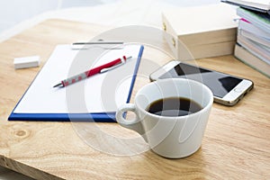 Have a cup of black coffee.And working with Blue Waiter notepad