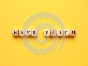 Have faith written with small wooden blocks