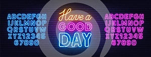 Have a Good Day neon lettering on brick wall background.