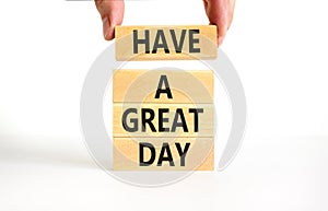 Have a great day symbol. Concept words Have a great day on wooden blocks. Beautiful white table white background. Businessman hand