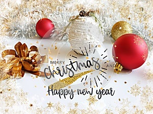 Have a Merry Christmas and Happy New Year,Christmas red silver gold  tree balls on white  background with snowflakes and  gold ele