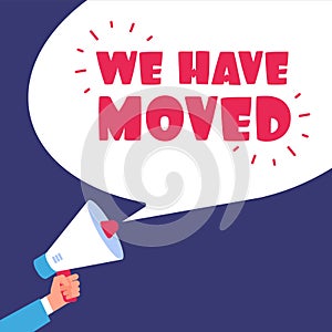 We have moved. Moving in new office. Business vector concept with megaphone photo